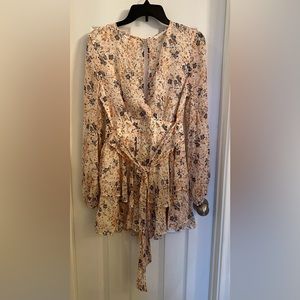 Long sleeve, sheer, gold metallic skorts. Size is large. Fits like a size 12